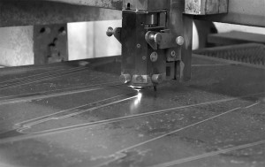 LE Sauer Machine Company laser detail