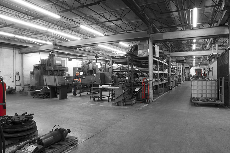 LE Sauer Machine Company Interior View with worker