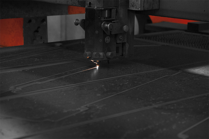 LE Sauer Machine Company laser detail